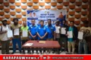 Foto bersama Pengurus Karteker DPD II KNPI Kabupaten Mimika dengan beberapa Ketua KNPI Distrik usah Rapat Pleno, yang digelar di Hotel Cartenz Timika, Jumat (26/6/2026) (karapauwnews.com/Foto: KNPI Kabupaten Mimika)